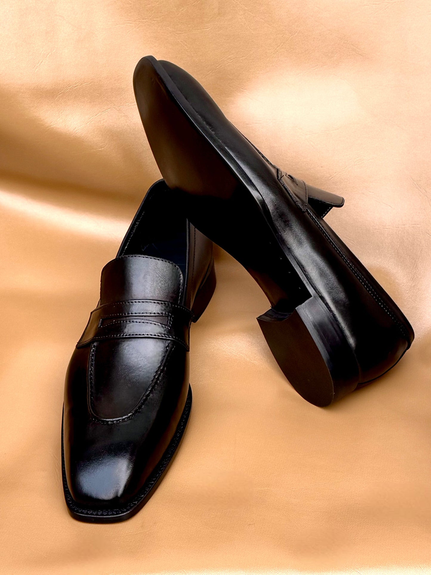 Black penny loafers