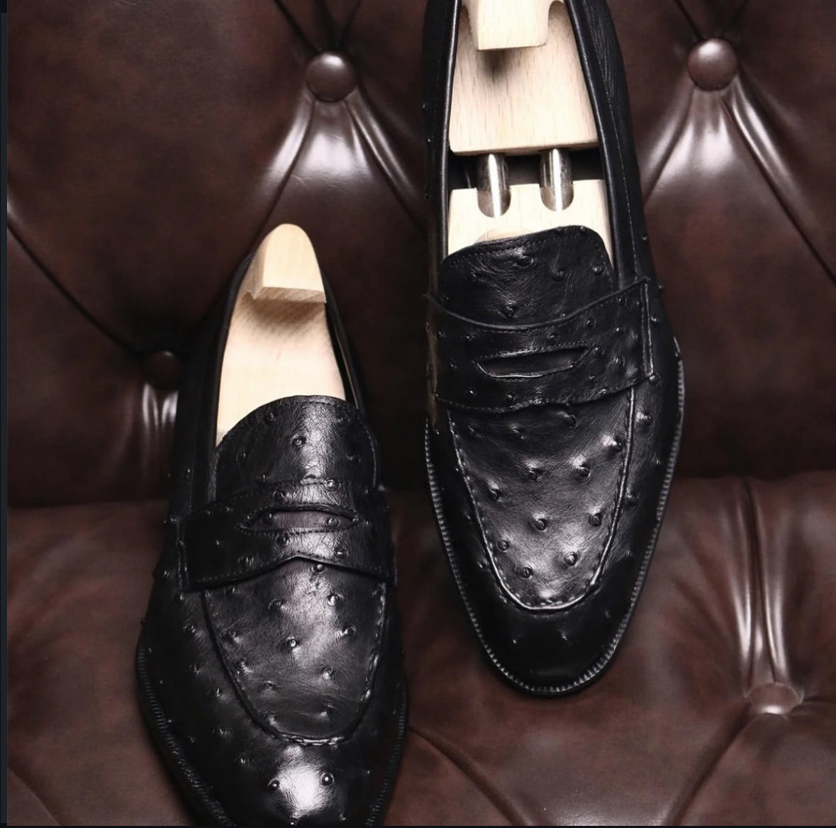 Black ostrich skin penny loafers