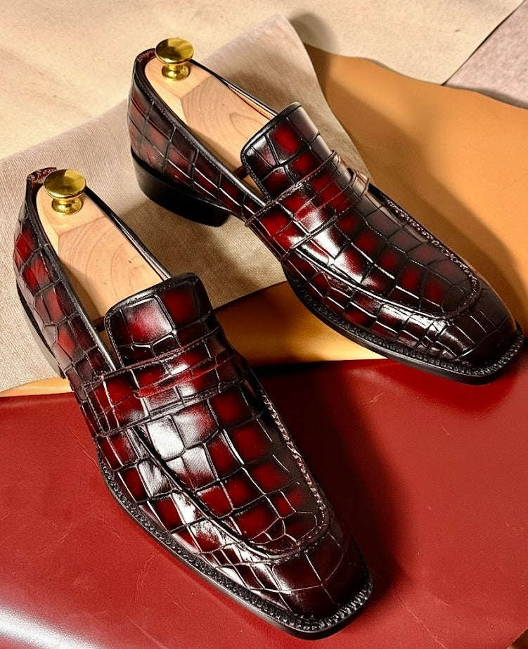Red crocodile penny loafers