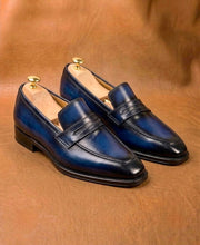Blue patina penny loafers