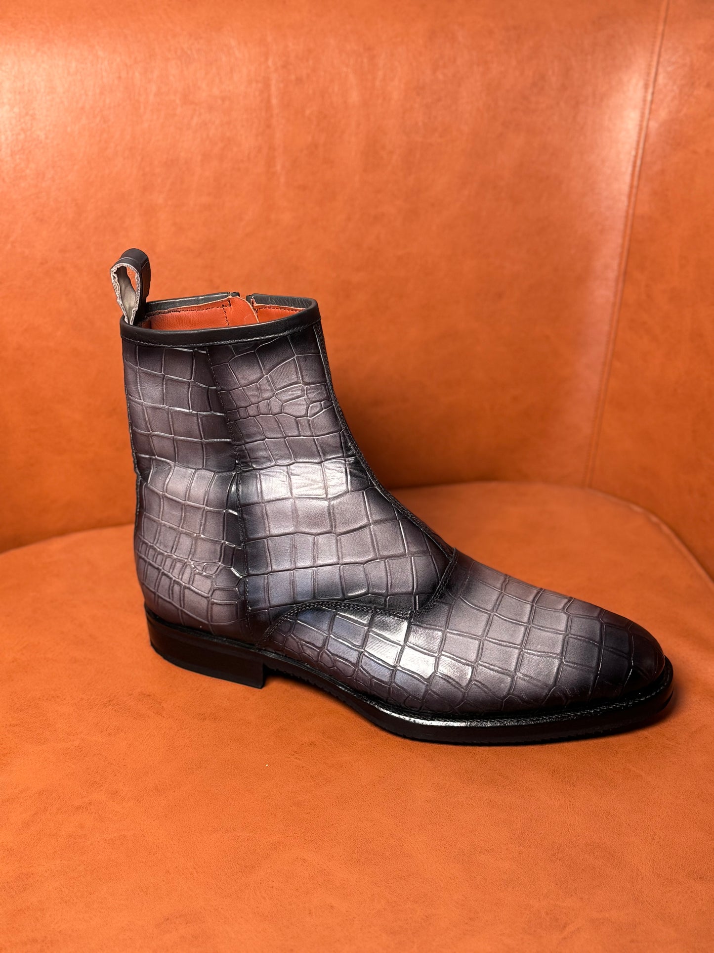 Gray and black patina croc boots