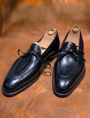 Black bow loafers