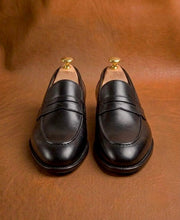 Black penny loafers
