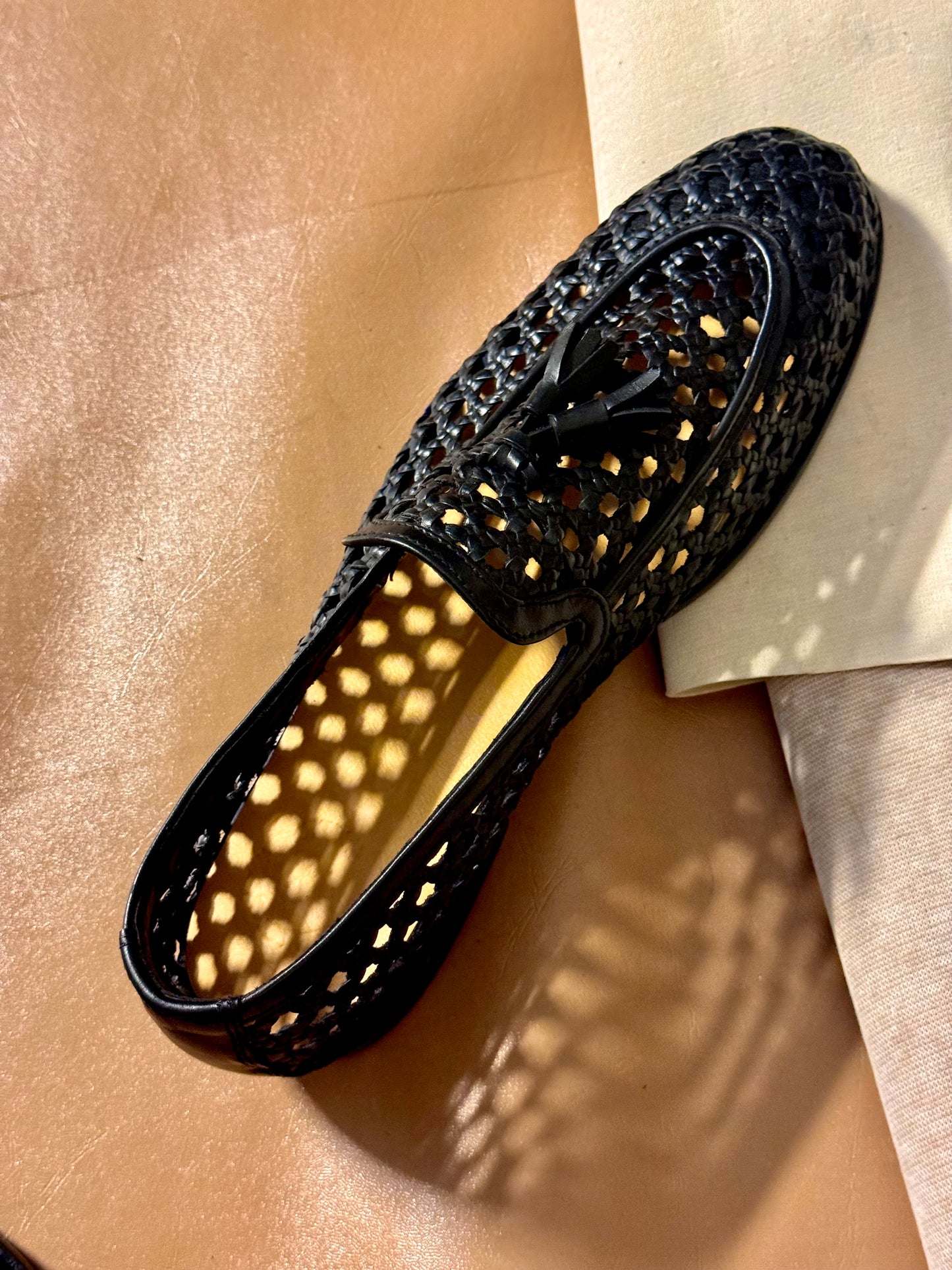 Black Intrecciato tassel loafers