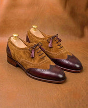Men's brown suede oxford shoes with calf panels, three-quarter view