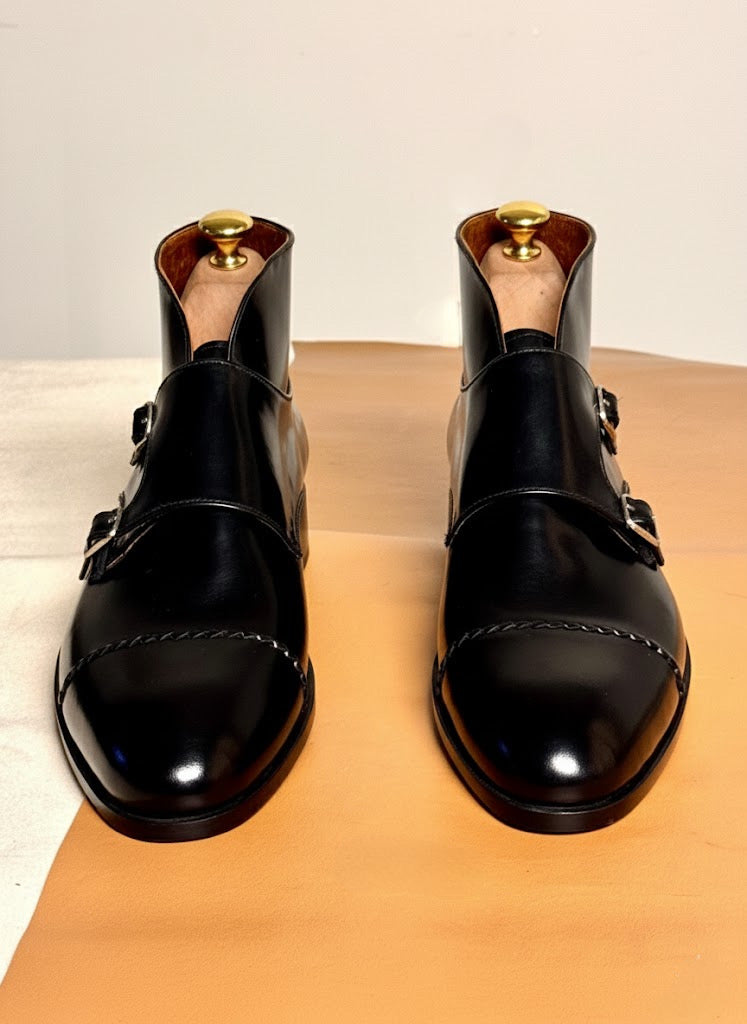 Black monks-strap boots