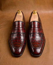 Red crocodile penny loafers