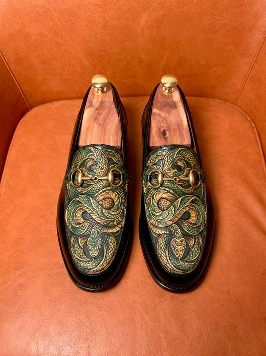 The ouroboros penny loafers