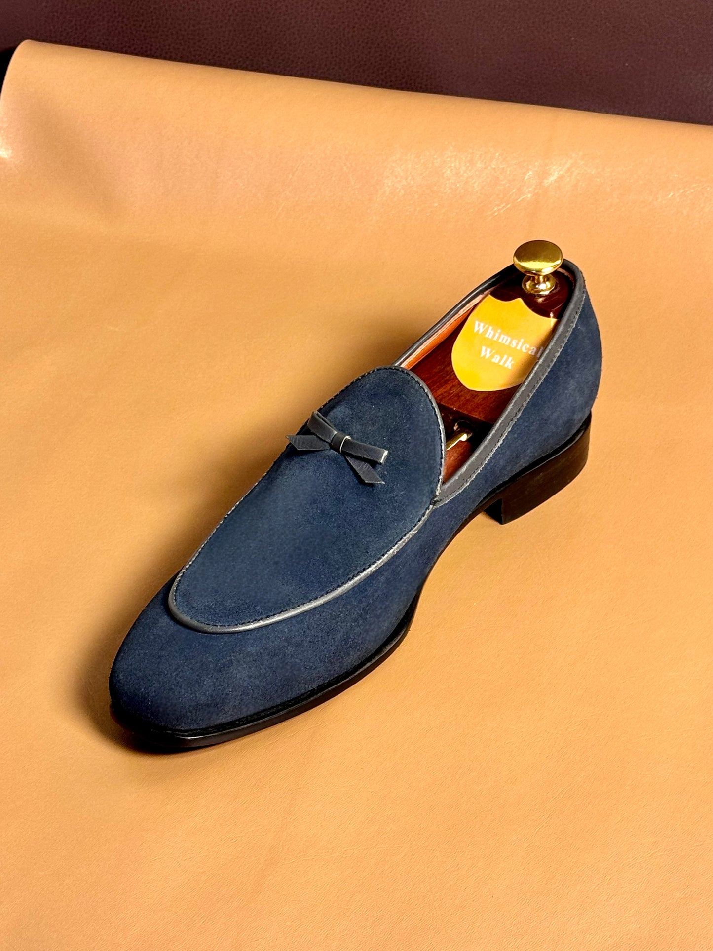 Blue bow loafers