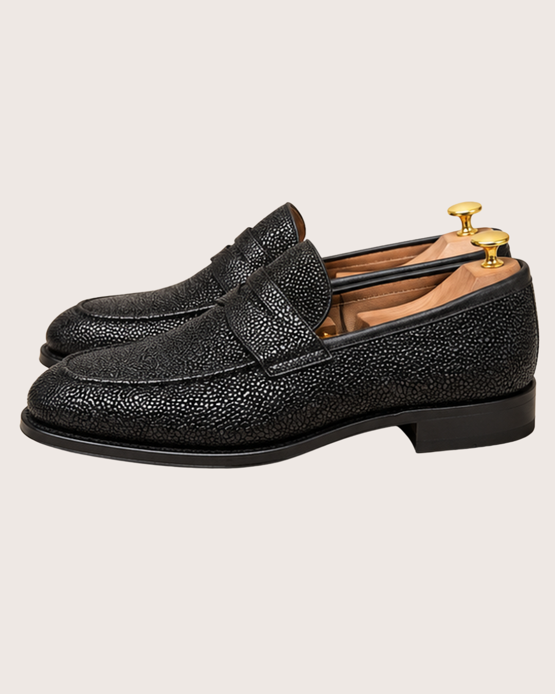 Black stingray penny loafers