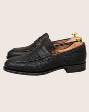 Black stingray penny loafers