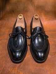 Black bow loafers