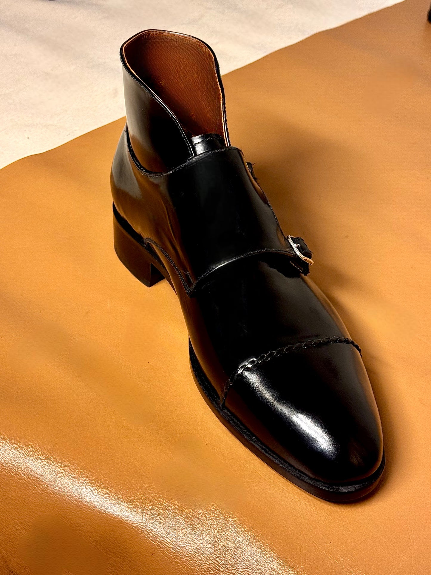 Black monks-strap boots