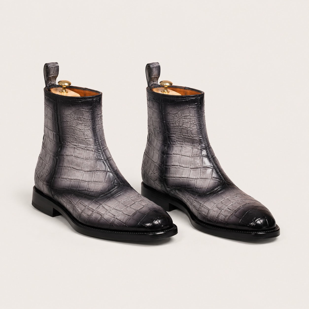 Gray and black patina boots
