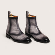 Gray and black patina boots
