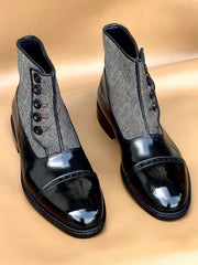 Black norwegian stitch button boots