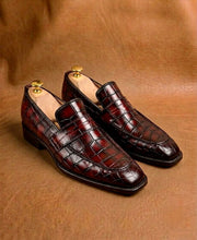 Red crocodile penny loafers