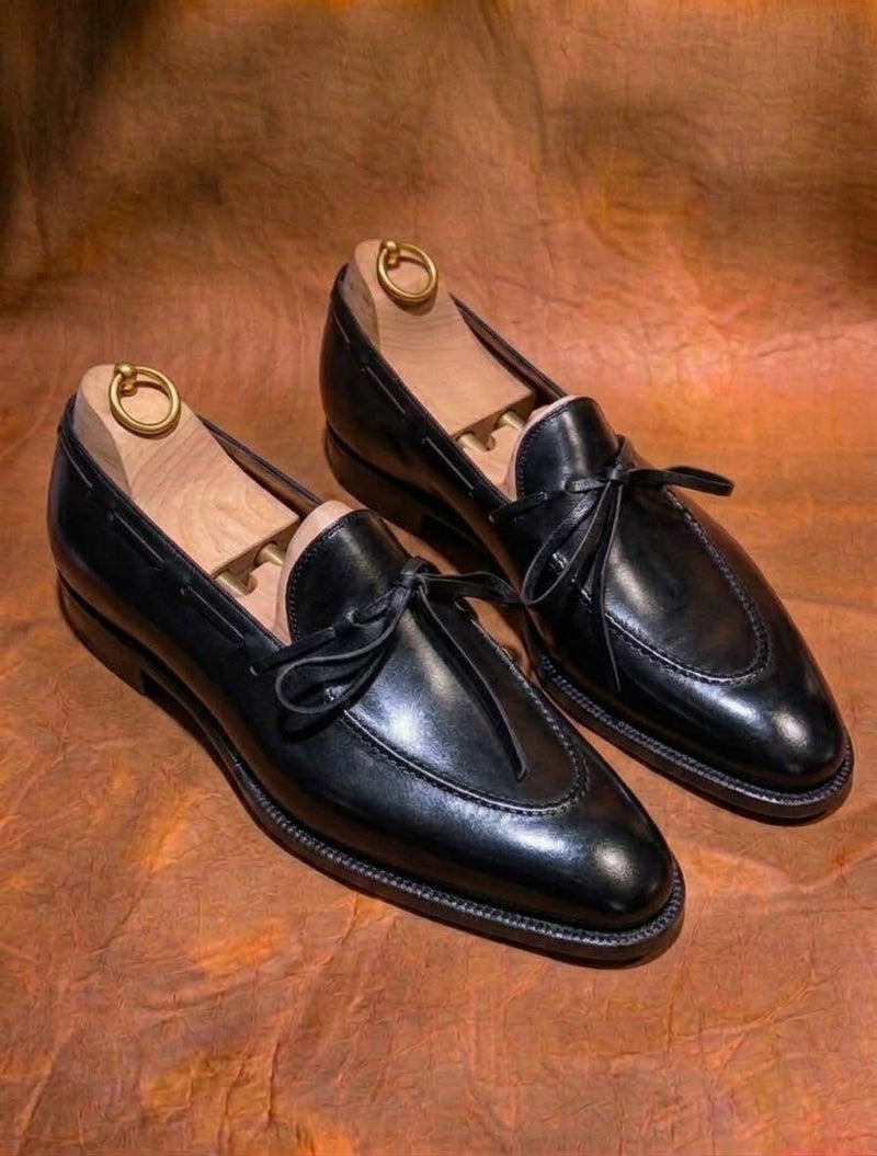 Black bow loafers