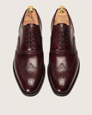 mens burgundy oxford dress shoes with navy suit

