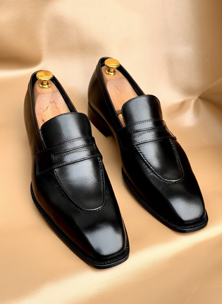 Black penny loafers