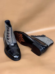 Black norwegian stitch button boots
