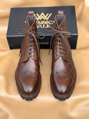 Brown wingtip boots
