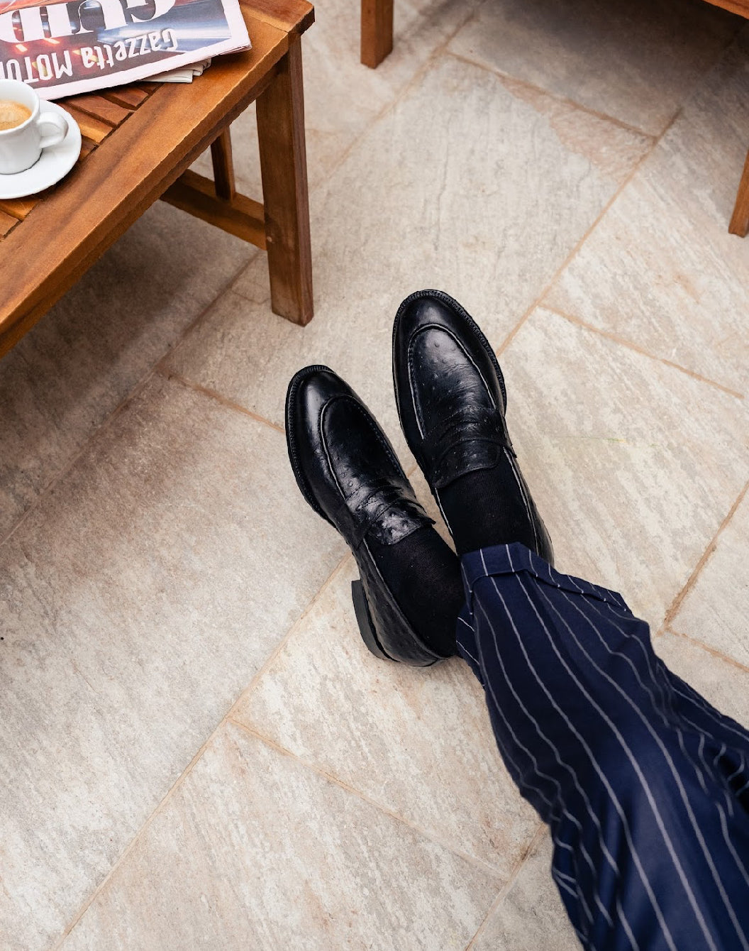 Black ostrich skin penny loafers