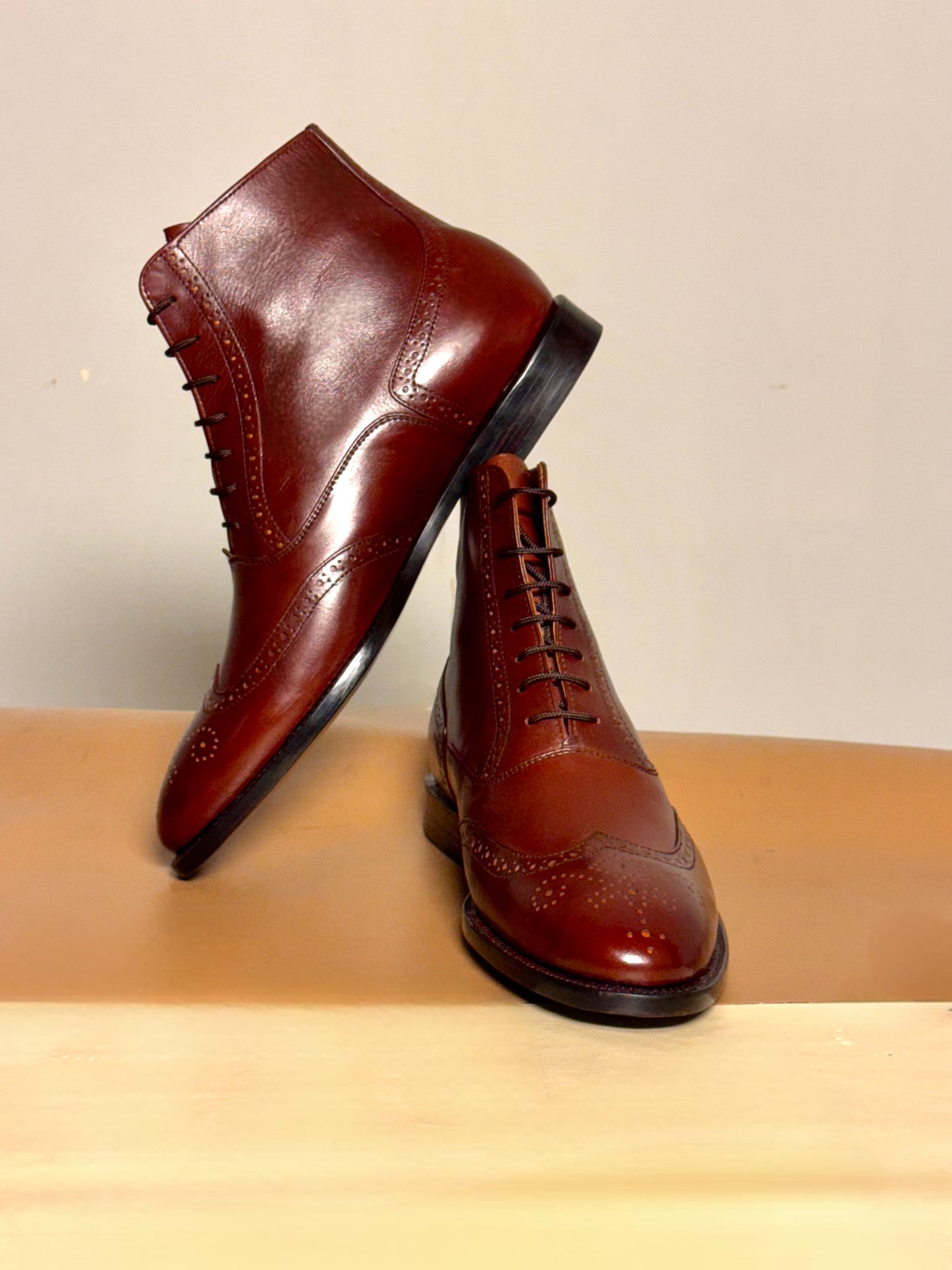 Brown wingtip boots