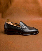 Black penny loafers