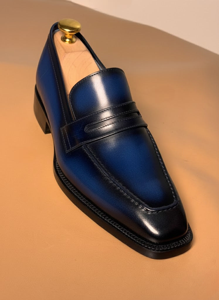 Blue patina penny loafers