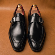 black single monk strap shoes with split toe, handmade leather