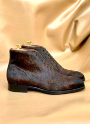 Two eyelet lacing on a brown horsehide chukka