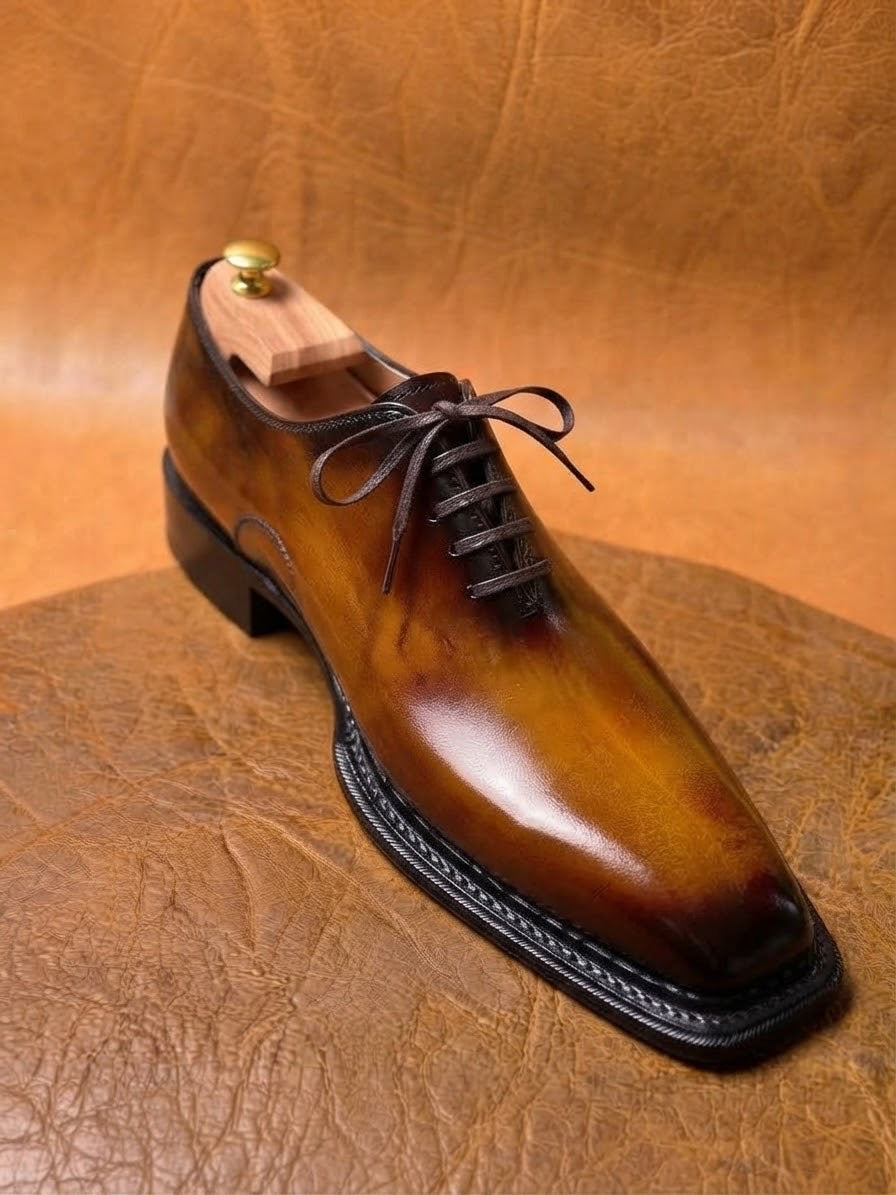 Tan burnished toe triple welt oxford