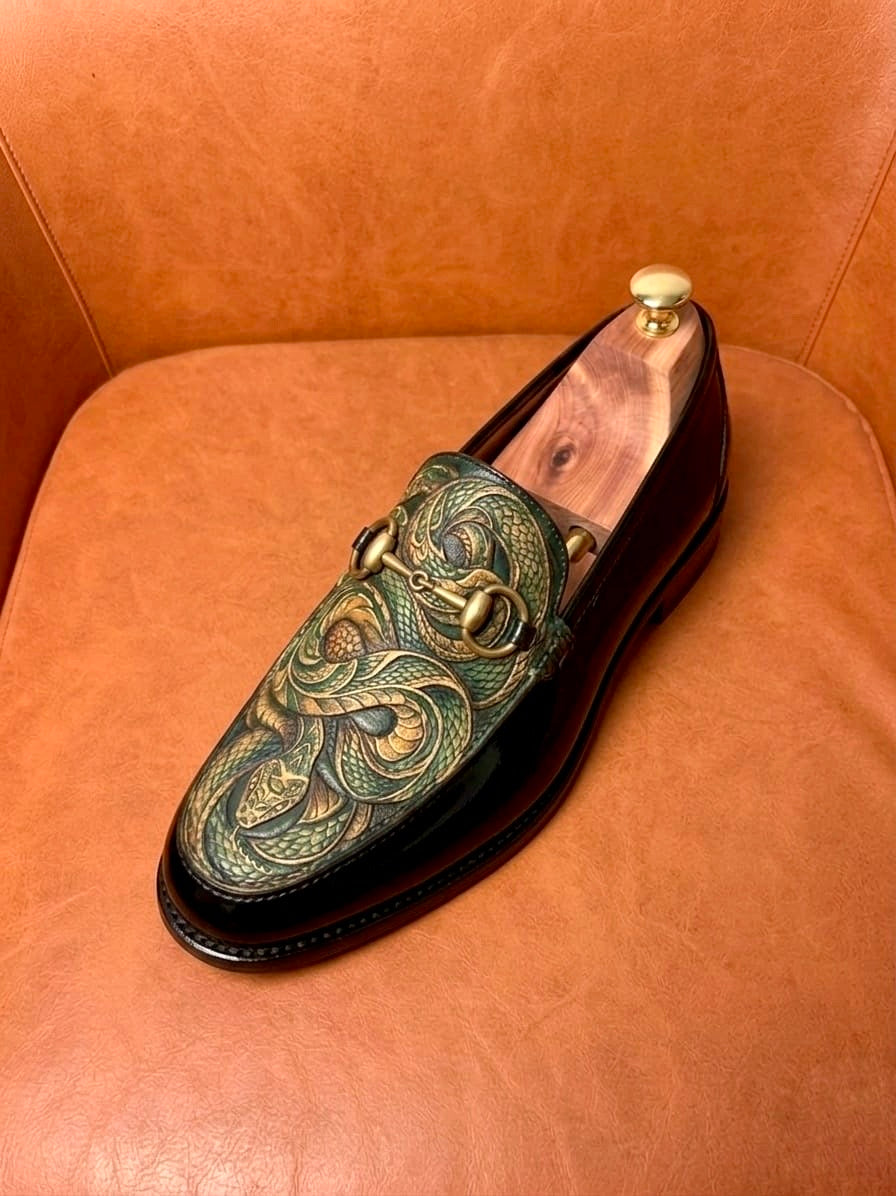 The ouroboros penny loafers