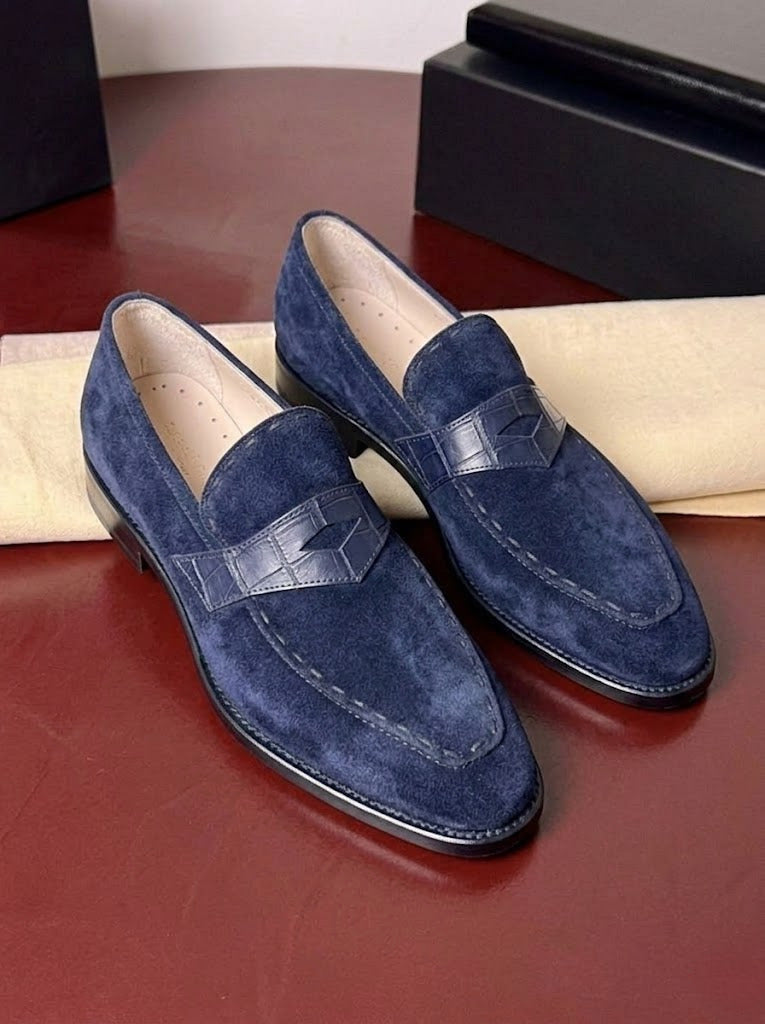 Blue suede penny loafers