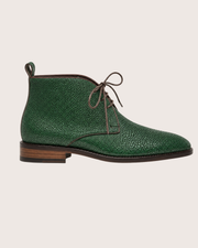 Leather sole and hand welted stitching on green stingray derby boots