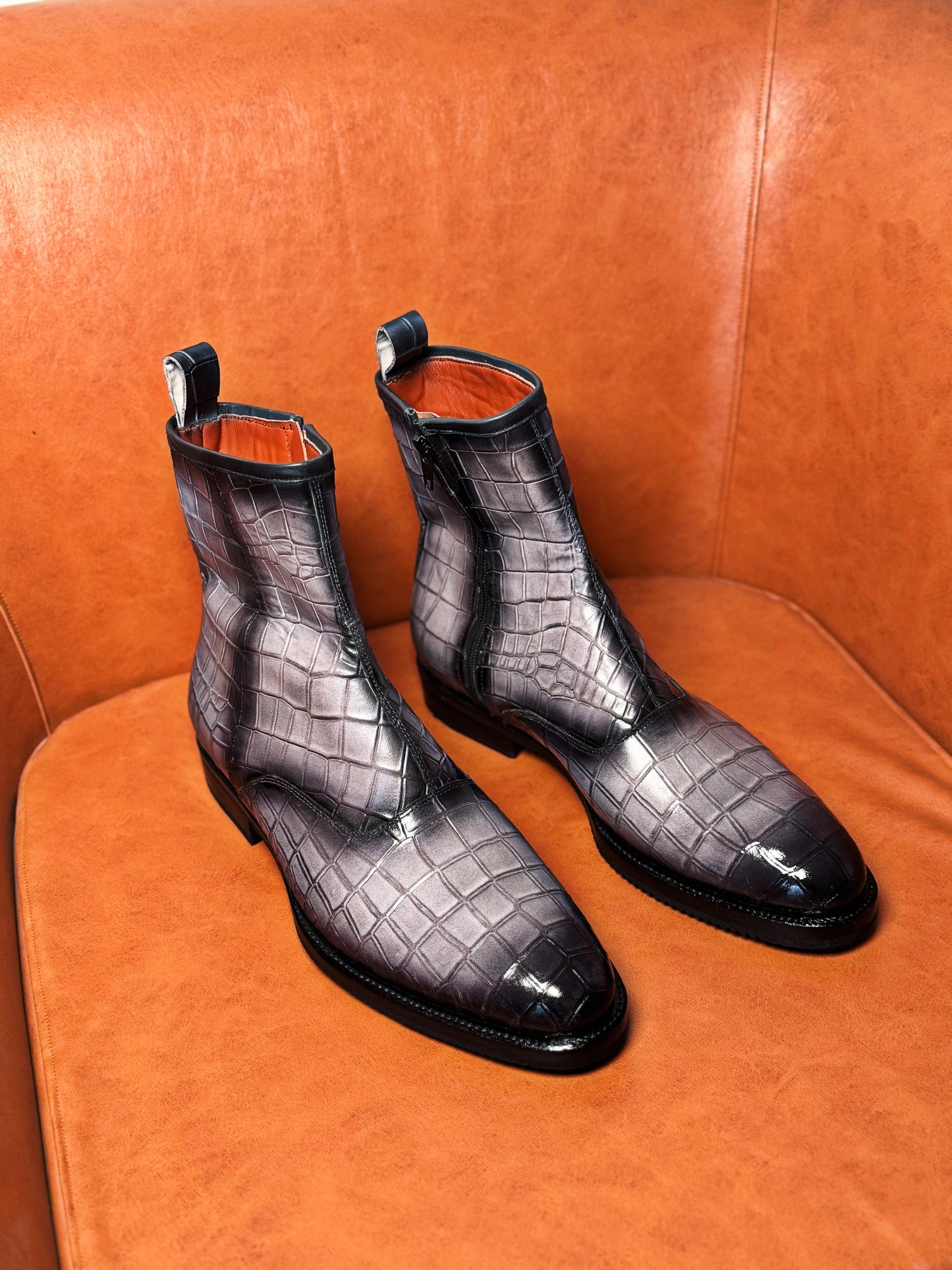 Gray and black patina croc boots
