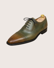 Green and brown patina oxford