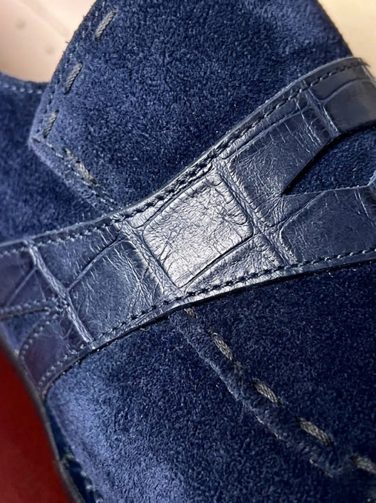 Blue suede penny loafers