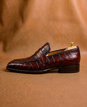 Red crocodile penny loafers