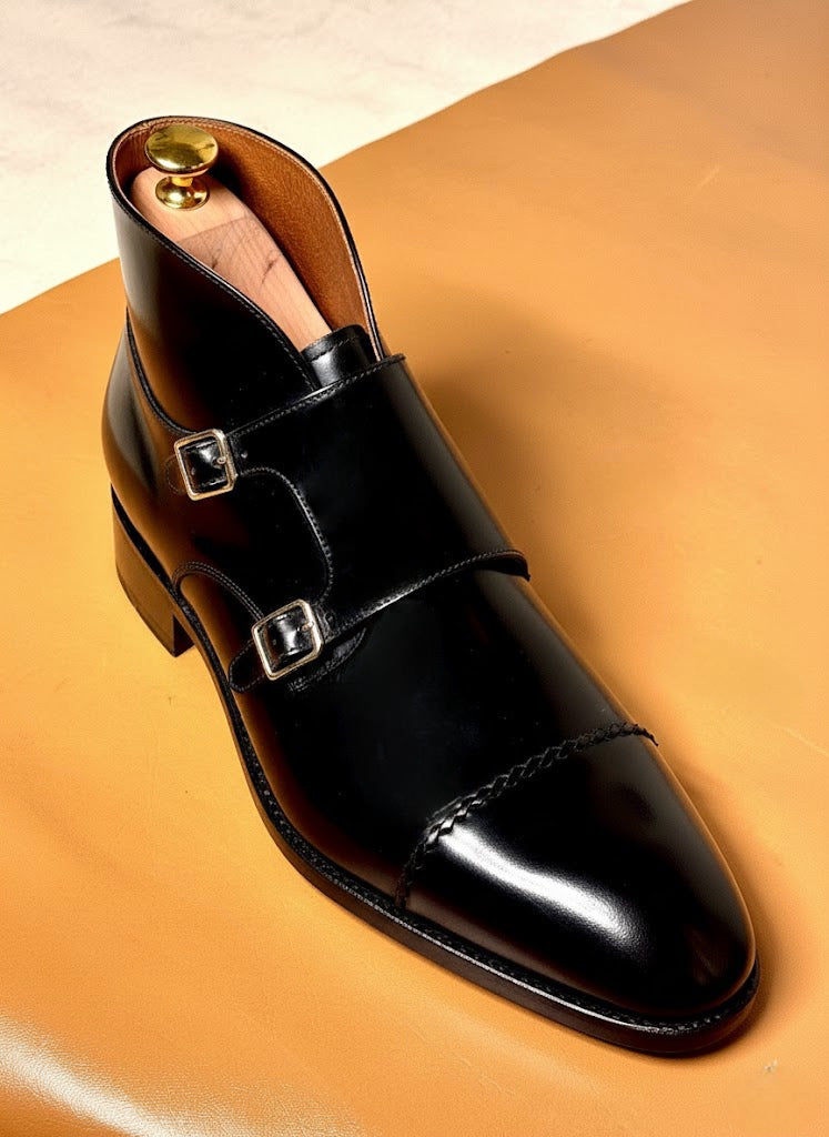 Black monks-strap boots