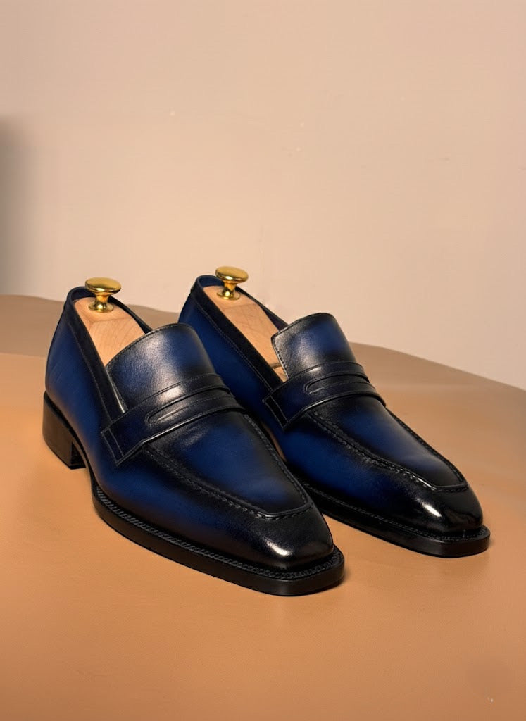 Blue patina penny loafers