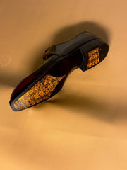 Stitched toe derby