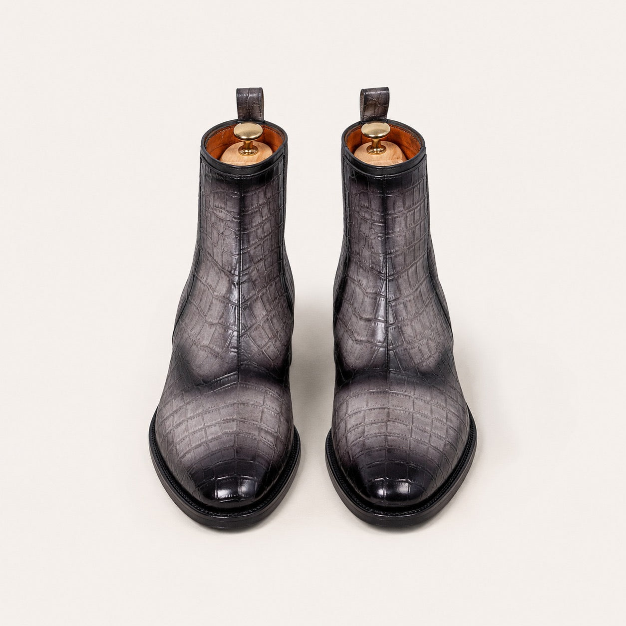 Gray and black patina boots