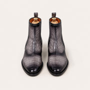 Gray and black patina boots