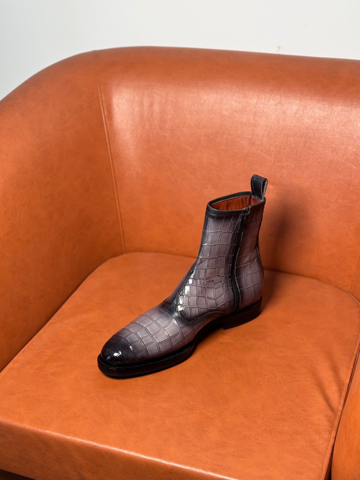 Gray and black patina croc boots