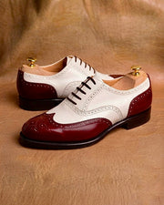Burgundy spectator wingtip oxford