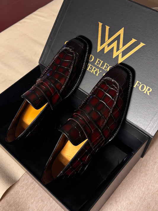 Red crocodile penny loafers
