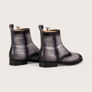 Gray and black patina boots