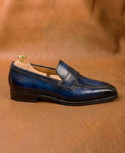 Blue patina penny loafers